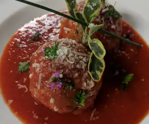 Meatball appetizer with marinara sauce. 